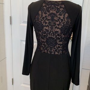 Elegant Size4 Like new Black dress (35”, from shoulder to hem) zipper see Photos